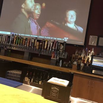 Buffalo Wild Wings - Taps and projector screen at the bar top - Chicken Wings Near Me - San Bernardino, California Buffalo Wild Wings - Taps and projector screen at the bar top - Chicken Wings Near Me - San Bernardino, California