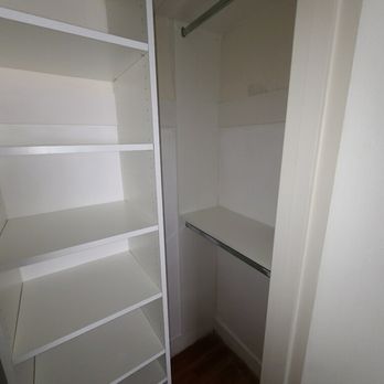 Closeted Solutions - Closet 2 - close up of the right side's double hanging. (Left side is identical) - Home Organization Near Me