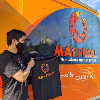 Más Pika - My buddy holding up an awesome shirt we were given by the owner! - Guamanian Near Me - Renton, Washington