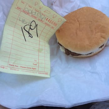 Hunt's Dairy Bar - A hamburger with mustard, onion and pickles. - Burgers Near Me - Farmington, Missouri Hunt's Dairy Bar - A hamburger with mustard, onion and pickles. - Burgers Near Me - Farmington, Missouri