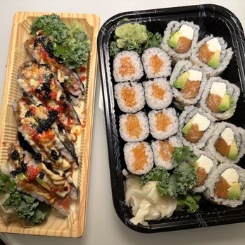 Star Cuisine - Takeout- (left) Sushi sandwich roll and (right) salmon maki and salmon cream cheese roll - Beverage Store Near Me - Fort Lee, New Jersey Star Cuisine - Takeout- (left) Sushi sandwich roll and (right) salmon maki and salmon cream cheese roll - Beverage Store Near Me - Fort Lee, New Jersey