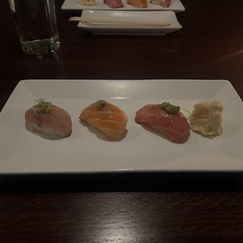 Tanoshi - Nigiri flight  hamachi + negi | sake + yuzu koshö | maguro + kizami wasabi - Sushi Bars Near Me - Chicago, Illinois