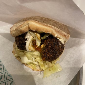 Fareground Austin - Falafel pita wrap - Food Court Near Me - Austin, Texas Fareground Austin - Falafel pita wrap - Food Court Near Me - Austin, Texas
