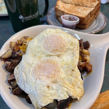 Connie's Cafe - Pot Roast Skillet with two eggs and homemade rye bread and their homemade preserves. - American Near Me - Ossineke, Michigan