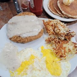 Perkins American Food - Chicken Fried Steak topped with gravy - hash brown & eggs