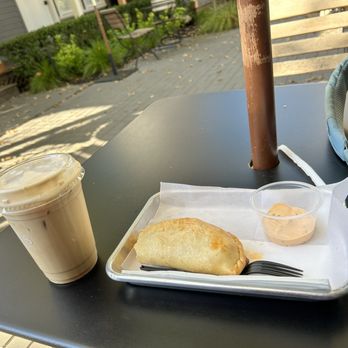 Sam's General Store - Empanada and pumpkin spice iced latte (not on the menu). - Coffee & Tea Near Me - Calistoga, California Sam's General Store - Empanada and pumpkin spice iced latte (not on the menu). - Coffee & Tea Near Me - Calistoga, California