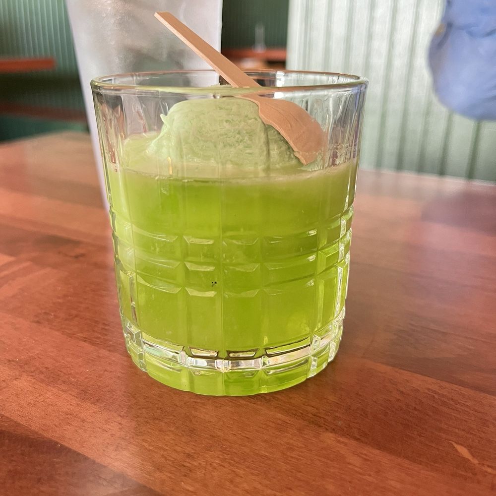 King BBQ - Karma Chameleon $12 gin cocktail with midori and lime sherbet - Barbeque Near Me - North Charleston, South Carolina