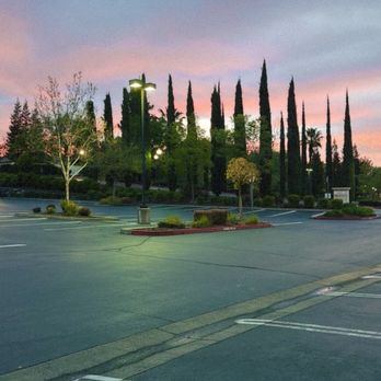 Baker's Dozen Donuts - sunrise and parking lot - Donuts Near Me - Folsom, California Baker's Dozen Donuts - sunrise and parking lot - Donuts Near Me - Folsom, California