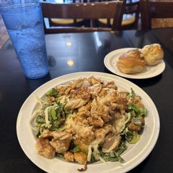 Chicken ceaser salad lunch special that comes with garlic bread and a drink