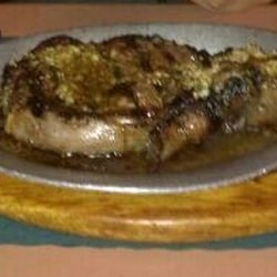 22oz Ribeye with fresh garlic and butter. Delish!