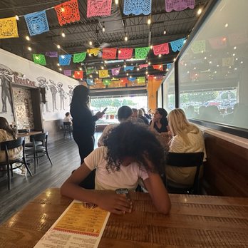 Guapo's Cocina & Bar - Indoor seating with big window. Gave indoor/outdoor vibes. - Mexican Near Me - Bethesda, Maryland