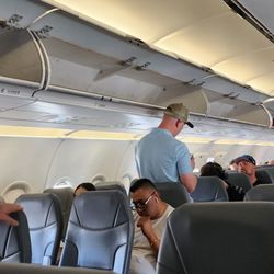 Frontier Airlines - No carry ons!even though we paid for it and last minute had to check when we were number 3 in li e - zone 1. NEVER FLY AGAIN