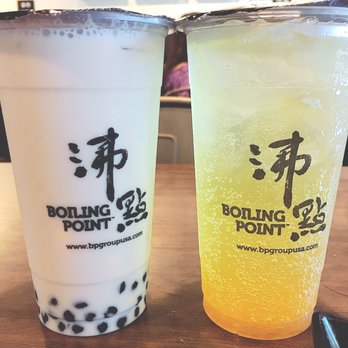 Boiling Point - Happy hour drinks! Caramel pudding boba milk tea (on the left) and pineapple soda (on the right) - Taiwanese Near Me - Bellevue, Washington