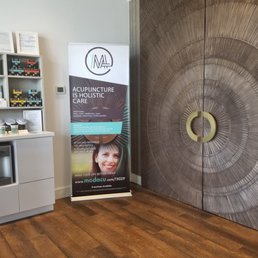 The reception area is bright and open. The hot tea station is to the left. The "Zen Den" is through the beautiful double doors. The reception area is bright and open. The hot tea station is to the left. The "Zen Den" is through the beautiful double doors.
