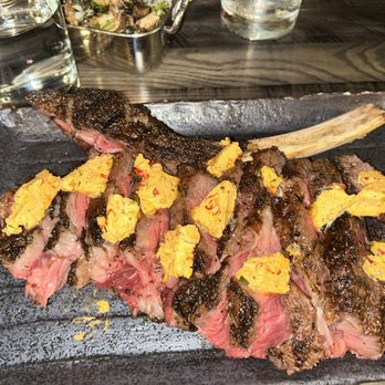 The Saint - Carved tomahawk - Steakhouses Near Me - Dallas, Texas