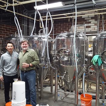 Hopstix - Larger view the the beer vats with Andy Tan - Breweries Near Me - Chamblee, Georgia