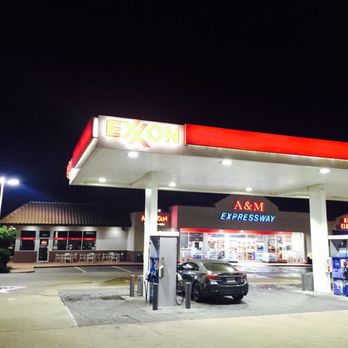 Exxon - a gas station at night - Gas Stations Near Me - College Station, Texas
