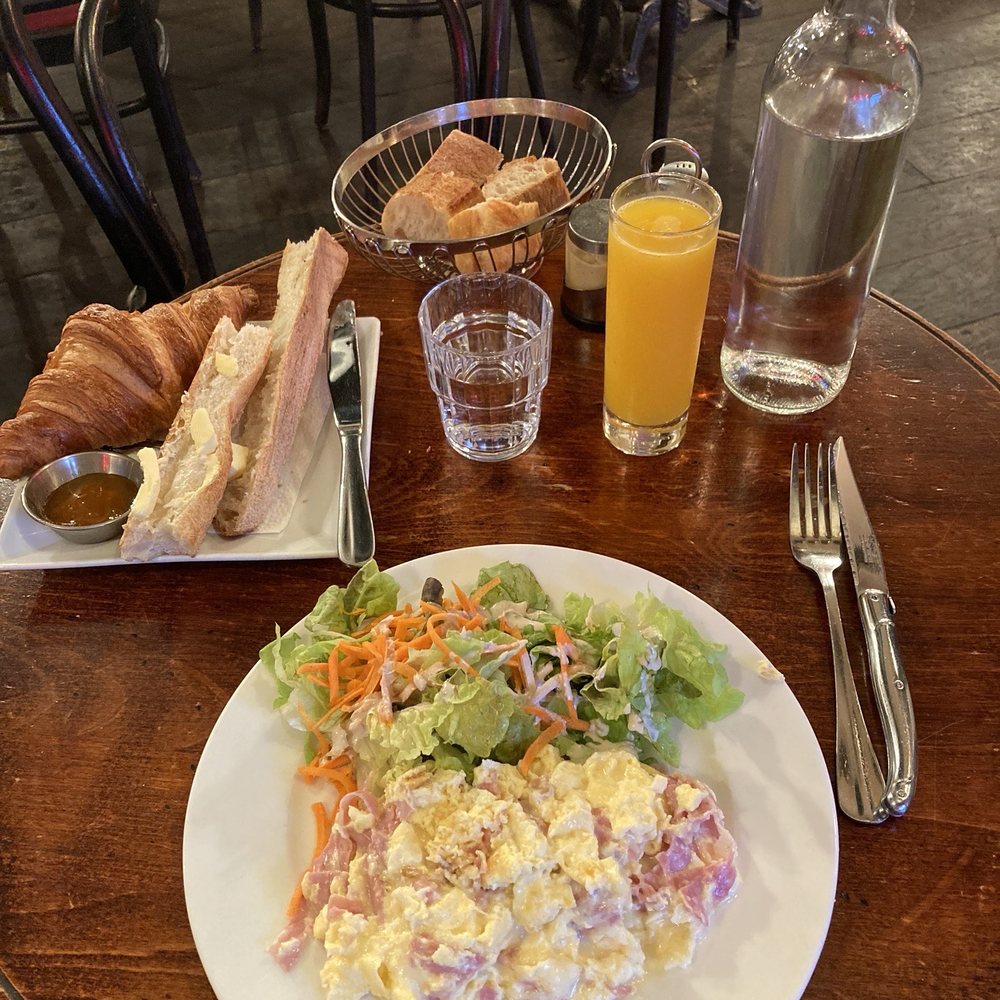Breakfast of scrambled eggs with ham and cheese. Breakfast of scrambled eggs with ham and cheese.