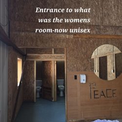 Acres of Wildlife Campground - The entrance to what used to be the women's room turned unisex. No signs.