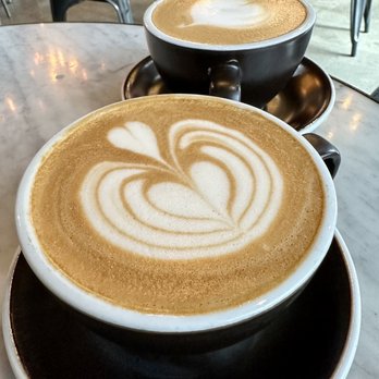 Alchemist Coffee Project - Hazelnut latte with oat milk (front) and caramel latte (back) - both were delicious with perfect amount of sweetness! - Coffee & Tea Near Me - Los Angeles, California