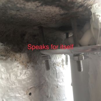 EC Ruff Marine - 2 inch gap they tried to cover up by filling the front with 5200 .. again we were charged for these custom pipes - Boat Repair Near Me - Pompano Beach, Florida