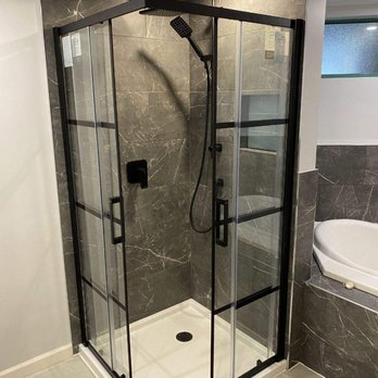 BCRC Contracting - a bathroom with a walk in shower - Flooring Near Me - North Vancouver, British Columbia