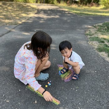 Florence Pointe Park - Leo eating chalk at the playground. Oh boy. - Parks Near Me - Portland, Oregon