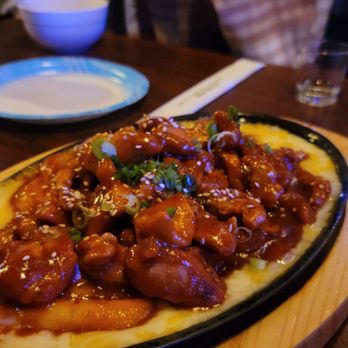 JJAN - a plate of food on a table - Gastropubs Near Me - Los Angeles, California JJAN - a plate of food on a table - Gastropubs Near Me - Los Angeles, California