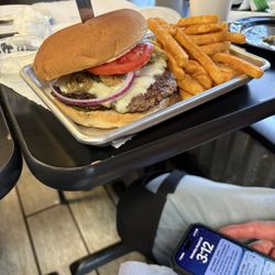 Hometown BBQ & Grill - Burger and fries. He ate every bite!