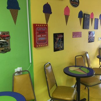 2 Scoops & Sprinkles - Tables with cones hanging over - Ice Cream & Frozen Yogurt Near Me - Fort Myers, Florida 2 Scoops & Sprinkles - Tables with cones hanging over - Ice Cream & Frozen Yogurt Near Me - Fort Myers, Florida