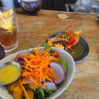 Tikis Grill & Bar - Coconut shrimp & house salad - Seafood Near Me - Honolulu, Hawaii Tikis Grill & Bar - Coconut shrimp & house salad - Seafood Near Me - Honolulu, Hawaii