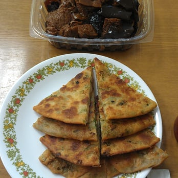 Katy's Dumplings - Fried veggie pancake and baked spongy gluten with vegetarian delicacies. Reminds me of home. :) - Chinese Near Me - Westmont, Illinois Katy's Dumplings - Fried veggie pancake and baked spongy gluten with vegetarian delicacies. Reminds me of home. :) - Chinese Near Me - Westmont, Illinois