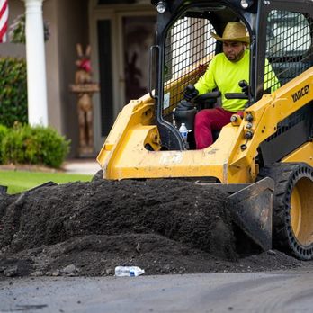 Blackjack Paving - Man performing asphalt paving in street - Masonry/Concrete Near Me - Fairburn, Georgia Blackjack Paving - Man performing asphalt paving in street - Masonry/Concrete Near Me - Fairburn, Georgia
