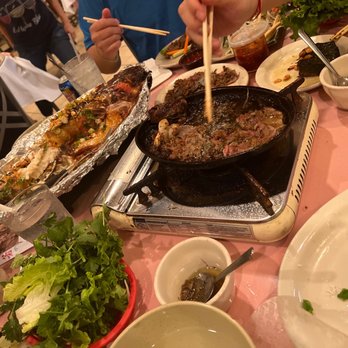 Saigon Pagolac - a table full of food - Vietnamese Near Me - Houston, Texas Saigon Pagolac - a table full of food - Vietnamese Near Me - Houston, Texas