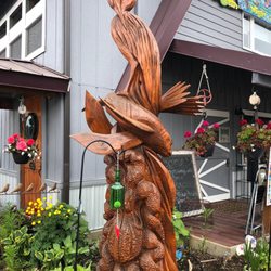 Asta Gallery and Suites - Chainsaw carving outside the gallery