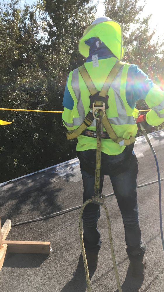 Slide of Dino Roofing Services