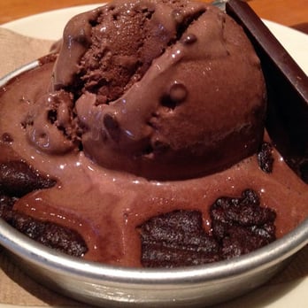 BJ's Restaurant & Brewhouse - Mini "Triple Chocolate Pizookie Made with Ghirardelli," perfect for chocolate lovers. - Pizza Near Me - Brea, California BJ's Restaurant & Brewhouse - Mini "Triple Chocolate Pizookie Made with Ghirardelli," perfect for chocolate lovers. - Pizza Near Me - Brea, California
