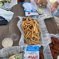 Barefoot Bar and Restaurant - Chicken Ceasar wrap, buffalo chicken bites, burger, jerk chicken burger, and fries