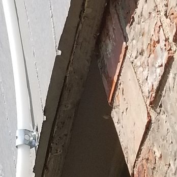 Mike Tschaar Heating & Air Conditioning - Rotten and molding siding under the line where the water has been pouring out. - Heating & Air Conditioning/HVAC Near Me - Abilene, Texas
