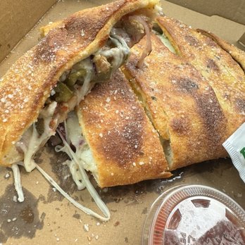 Romanos Pizza - Small sausage, jalapeño and onion calzone... - Italian Near Me - Lake Dallas, Texas Romanos Pizza - Small sausage, jalapeño and onion calzone... - Italian Near Me - Lake Dallas, Texas