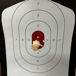 Bulls Eye Marksman Gun Club - Shooting target with a hole in the center area