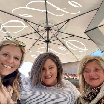 Doffo Wines - Enjoying our tasting flight on the outdoor patio under the shade of the umbrellas. - Wineries Near Me - Temecula, California