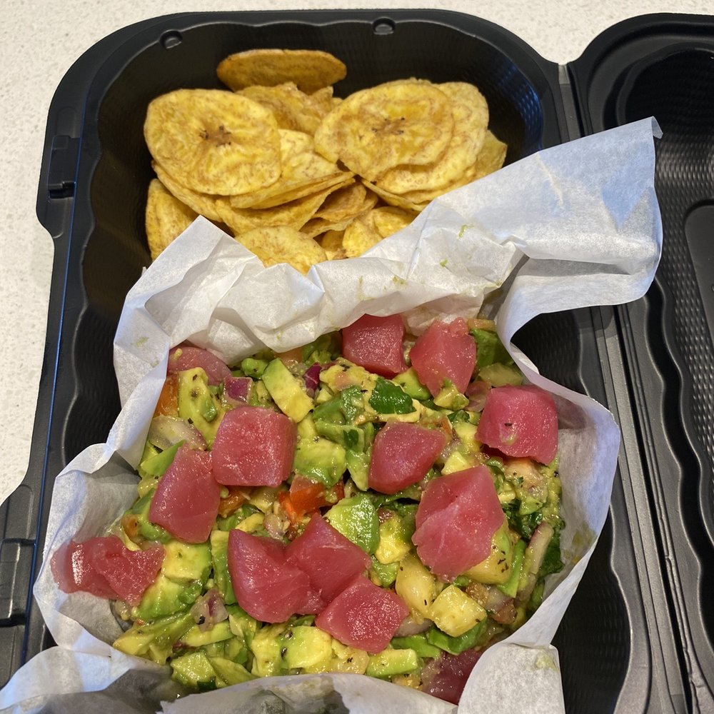 Guac Bowl - ahi tuna with sweet and spicy flavor paired with plantain chips Guac Bowl - ahi tuna with sweet and spicy flavor paired with plantain chips