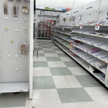 JOANN Fabric and Crafts - Maybe the product that goes on these shelves are in some of the boxes in the isles? - Fabric Stores Near Me - Puyallup, Washington