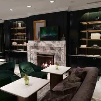 Peacock Lounge - a fireplace in the middle of the room - Lounges Near Me - Chicago, Illinois Peacock Lounge - a fireplace in the middle of the room - Lounges Near Me - Chicago, Illinois