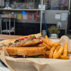Cozmic Charlie’s Cheeze Shack - Italian beef grilled cheese with Battered fries.