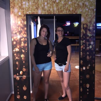 Fast Eddies Pool Hall - two women standing in a photo booth - Pool Halls Near Me - Terrell, Texas Fast Eddies Pool Hall - two women standing in a photo booth - Pool Halls Near Me - Terrell, Texas