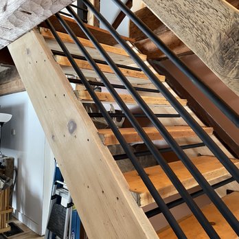 MTN DOG Custom Works - Black horizontal stair railing. Adding a modern touch to this historical cap cod built in 1792. - General Contractors Near Me MTN DOG Custom Works - Black horizontal stair railing. Adding a modern touch to this historical cap cod built in 1792. - General Contractors Near Me