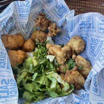 Salt Shack - These were the fish bites-they tasted good but not enough in the basket for the expensive price. - Seafood Near Me - Clermont, Florida Salt Shack - These were the fish bites-they tasted good but not enough in the basket for the expensive price. - Seafood Near Me - Clermont, Florida
