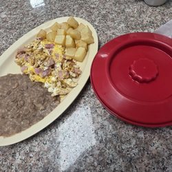 Taqueria El Regio - Breakfast plate with ham and eggs, refried beans, papas fritas, and flour tortillas